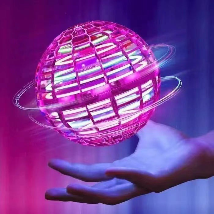 Naivah Magic Flying Ball in hand, pink/magenta light